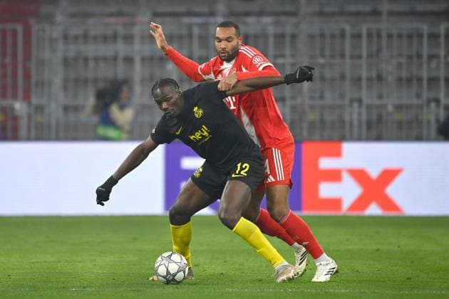 Jonathan TAH (Bayern Muenchen), Aktion,Zweikampf gegen Promise DAVID (Saint Gilloise). Fussball Champions League,Saison 2025 26, Ligaphase FC Bayern Muenchen - Royale Union Saint-Gilloise am 21.01.2026.