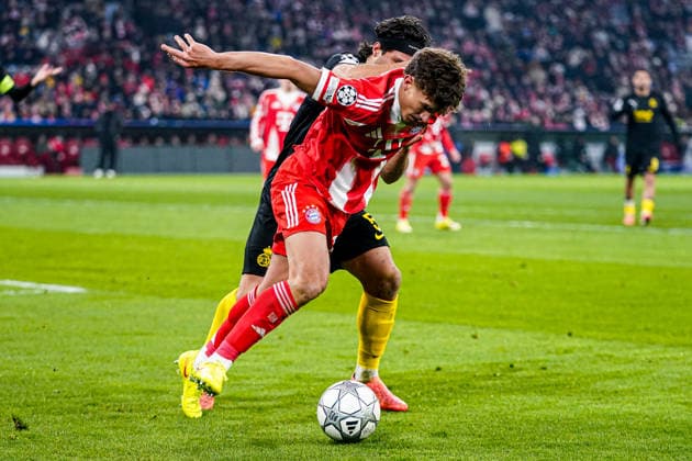 2026-01-21 FC Bayern München v R. Union Saint-Gilloise - UEFA Champions League 2025 26 League Phase MD7 MUNICH, GERMANY - JANUARY 21: Kevin Mac Allister of R. Union Saint-Gilloise, Tom Bischof of FC Bayern Munchen battle for the ball during the UEFA Champions League 2025 26 League Phase MD7 match between FC Bayern M++nchen and R. Union Saint-Gilloise at Football Arena Munich on January 21, 2026 in Munich, Germany. Munich Football Arena Munich Germany Content not available for redistribution in The Netherlands directly or indirectly through any third parties. Copyright: xAndrexWeeningx