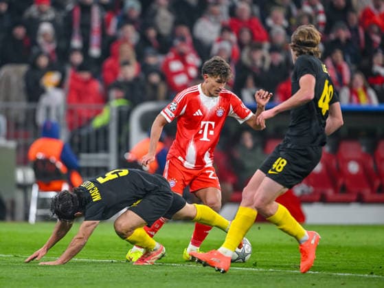 Kevin Mac Allister (R. Union Saint-Gilloise), Tom Bischof (FC Bayern München) und Fedde Leysen (R. Union Saint-Gilloise) battle for the ball during the UEFA Champions League 2025 26 League Phase MD7 match between FC Bayern München and R. Union Saint-Gilloise at Football Arena Munich on January 21, 2026 in Munich, Germany. (Photo by Harry Langer DeFodi Images) -