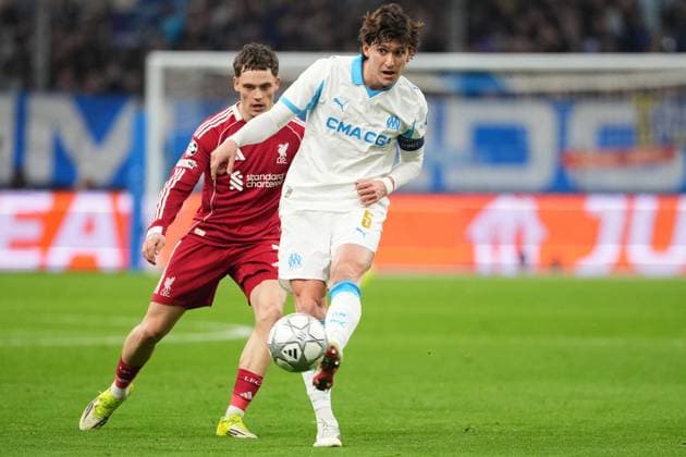 Leonardo Balerdi of Marseille holds off Florian Wirtz of Liverpool Marseille v Liverpool, UEFA Champions League, Group Stage, Football, Orange Velodrome, Marseille, France - 21 Jan 2026Marseille Orange Vélodrome France EDITORIAL USE ONLY No use with unauthorised audio, video, data, fixture lists, club league logos or live services. Online in-match use limited to 120 images, no video emulation. No use in betting, games or single club league player publications. Copyright: xDavexWinter Shutterstockx 16348361ji