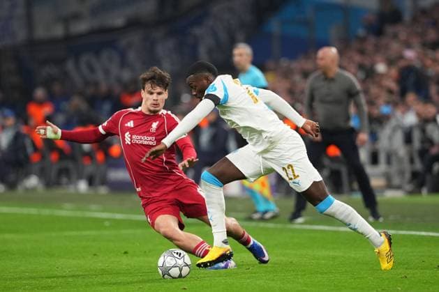 Timothy Weah of Marseille takes on Milos Kerkez of Liverpool Marseille v Liverpool, UEFA Champions League, Group Stage, Football, Orange Velodrome, Marseille, France - 21 Jan 2026Marseille Orange Vélodrome France EDITORIAL USE ONLY No use with unauthorised audio, video, data, fixture lists, club league logos or live services. Online in-match use limited to 120 images, no video emulation. No use in betting, games or single club league player publications. Copyright: xDavexWinter Shutterstockx 16348361ja