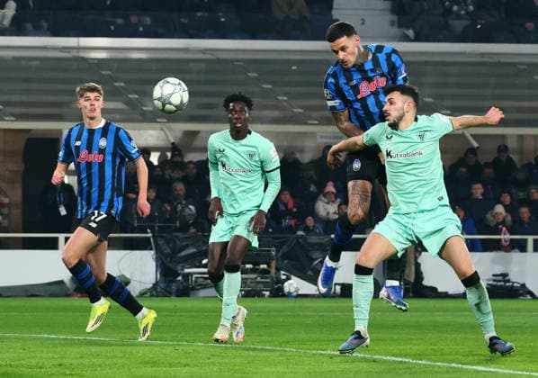 (260122) -- BERGAMO, Jan. 22, 2026 () -- Atalanta s Gianluca Scamacca (top) heads the ball to score during the UEFA Champions League match between Atalanta and Athletic Club in Bergamo, Italy, Jan. 21, 2026. () (SP)ITALY-BERGAMO-FOOTBALL-UEFA CHAMPIONS LEAGUE-ATALANTA VS ATHLETIC CLUB Xinhua 