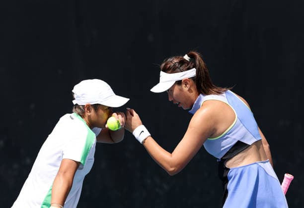 (260122) -- MELBOURNE, Jan. 22, 2026 -- Jiang Xinyu (L) Chan Hao-Ching react during the women s doubles 1st round match between Jiang Xinyu (China) Chan Hao-Ching (Chinese Taipei) and Anna Blinkova (Russia) Kamilla Rakhimova (Uzbekistan) at the Australian Open tennis tournament in Melbourne, Australia, Jan. 22, 2026. ) (SP)AUSTRALIA-MELBOURNE-TENNIS-AUSTRALIAN OPEN-WOMEN S DOUBLES-DAY 5 MaxPing 
