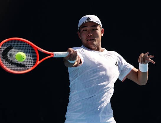 (260122) -- MELBOURNE, Jan. 22, 2026 -- Wu Yibing hits a return during the men s singles 2nd round match between Wu Yibing of China and Eliot Spizzirri of the United States at the Australian Open tennis tournament in Melbourne, Australia, Jan. 22, 2026. ) (SP)AUSTRALIA-MELBOURNE-TENNIS-AUSTRALIAN OPEN-MEN S SINGLES MaxPing 