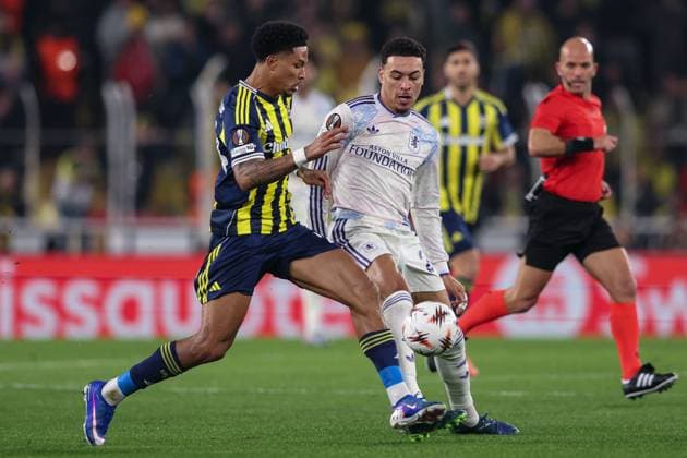 Morgan Rogersof Aston Villa is tackled by Jayden Oosterwolde of Fenerbahce Fenerbache v Aston Villa, UEFA Europa League, Group Stage, Football, Sukru Saracoglu Stadium, Istanbul, Turkiye - 22 Jan 2026Istanbul Sukru Saracoglu Stadium Turkey EDITORIAL USE ONLY No use with unauthorised audio, video, data, fixture lists, club league logos or live services. Online in-match use limited to 120 images, no video emulation. No use in betting, games or single club league player publications. Copyright: xRaddadxJebarah Shutterstockx 16348379ah