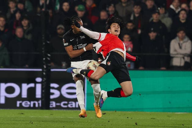 2026-01-22 Feyenoord v SK Sturm Graz - UEFA Europa League, League phase, MD7 ROTTERDAM, NETHERLANDS - JANUARY 22: Ayase Ueda of Feyenoordis tackled byEmanuel Aiwu of SK Sturm Graz during the UEFA Europa League, League phase, MD7 match between Feyenoord and SK Sturm Graz at Stadion Feijenoord on January 22, 2026 in Rotterdam, Netherlands. Rotterdam Stadion Feijenoord Netherlands Content not available for redistribution in The Netherlands directly or indirectly through any third parties. Copyright: xHansxvanxderxValkx