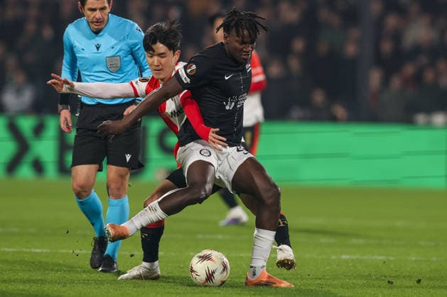 2026-01-22 Feyenoord v SK Sturm Graz - UEFA Europa League, League phase, MD7 ROTTERDAM, NETHERLANDS - JANUARY 22: Inbeom Hwang of Feyenoord battles for the ball with Seedy Jatta of SK Sturm Graz during the UEFA Europa League, League phase, MD7 match between Feyenoord and SK Sturm Graz at Stadion Feijenoord on January 22, 2026 in Rotterdam, Netherlands. Rotterdam Stadion Feijenoord Netherlands Content not available for redistribution in The Netherlands directly or indirectly through any third parties. Copyright: xHansxvanxderxValkx