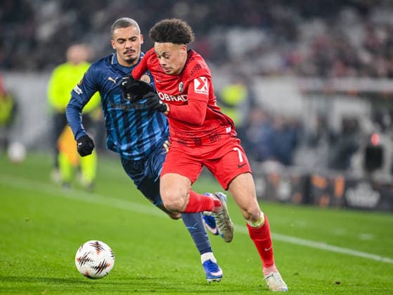 Saied Abu Farchi (Maccabi Tel-Aviv FC) und Derry Scherhant (SC Freiburg) battle for the ball during the UEFA Europa League 2025 26 League Phase MD7 match between SC Freiburg and Maccabi Tel-Aviv FC at Stadion am Wolfswinkel on January 22, 2026 in Freiburg im Breisgau, Germany. (Photo by Harry Langer DeFodi Images) -