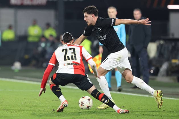 SOCCER - UEFA EL, Feyenoord vs Sturm ROTTERDAM,NETHERLANDS,22.JAN.26 - SOCCER - UEFA Europa League, Feyenoord Rotterdam vs SK Sturm Graz. Image shows Anis Hadj Moussa (Feyenoord) and Emir Karic (Sturm).  GEPAxpictures xChrisxBauer