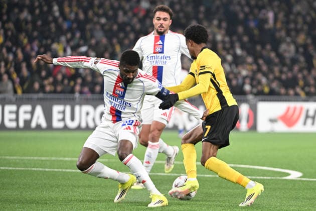BERN, SWITZERLAND - JANUARY 22: Clinton Mata of Olympique Lyonnais l) against Alan Virginius of Young Boys r) during the UEFA Europa League 2025 26 League Phase MD7 match between BSC Young Boys and Olympique Lyonnais at Stadion Wankdorf on January 22, 2026 in Bern, Switzerland. Bern Stadion Wankdorf Bern Switzerland Copyright: xJustPictures.ch ManuelxWinterbergerx jp-en-EuSpIm-MWI_6693