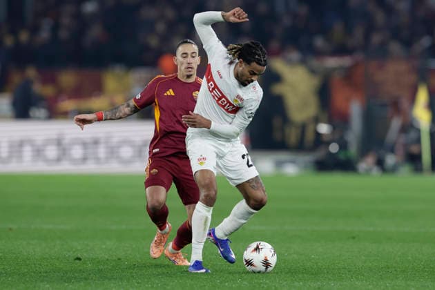 UEFA Europa League phase match day 7 AS Roma vs VfB Stuttgart Stuttgart s French defender Lorenz Assignon challenges for the ball with Roma™s Greek defender Kostas Tsimikas during UEFA Europa League phase match day 7 between AS Roma vs VfB Stuttgart at Olimpico stadium on November 22, 2026 in Rome, Italy. _BPH0076 Copyright: xAntonioxBalascox