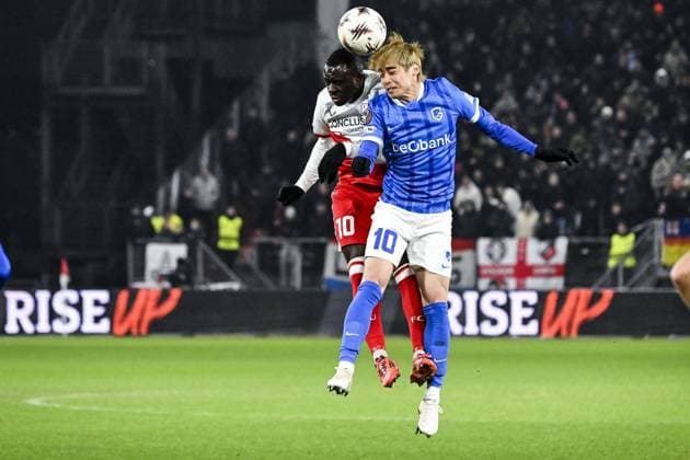 Utrecht s Yoann Cathline and Genk s Junya Ito pictured in action during a soccer game between Dutch soccer club FC Utrecht and Belgian KRC Genk, on Thursday 22 January 2026 in Utrecht, Netherlands, the seventh game (out of 8) in the league phase of the UEFA Europa League competition. TOM GOYVAERTS TomxGoyvaerts  x157816858x