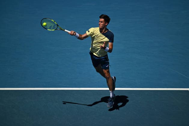 TENNIS AUSTRALIAN OPEN, Fabian Marozsan of Hungary in action during the Men™s 3rd round match against Daniil Medvedev of Russia on day 6 of the 2026 Australian Open tennis tournament at Melbourne Park in Melbourne, Friday, January 23, 2026. ( NO ARCHIVING MELBOURNE VICTORIA AUSTRALIA  Copyright: xLUKASxCOCHx 20260123123715835103
