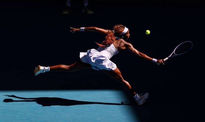 (260123) -- MELBOURNE, Jan. 23, 2026 -- Coco Gauff of the United States hits a return during the women s singles 3rd round match against Hailey Baptiste of the United States at the Australian Open tennis tournament in Melbourne, Australia, Jan. 23, 2026. ) (SP)AUSTRALIA-MELBOURNE-TENNIS-AUSTRALIAN OPEN-WOMEN S SINGLES MaxPing 