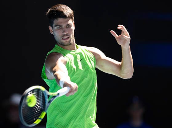 (260123) -- MELBOURNE, Jan. 23, 2026 -- Carlos Alcaraz of Spain hits a return during the men s singles 3rd round match against Corentin Moutet of France at the Australian Open tennis tournament in Melbourne, Australia, Jan. 23, 2026. (Photo by Xinhua) (SP)AUSTRALIA-MELBOURNE-TENNIS-AUSTRALIAN OPEN-MEN S SINGLES HuxJingchen 