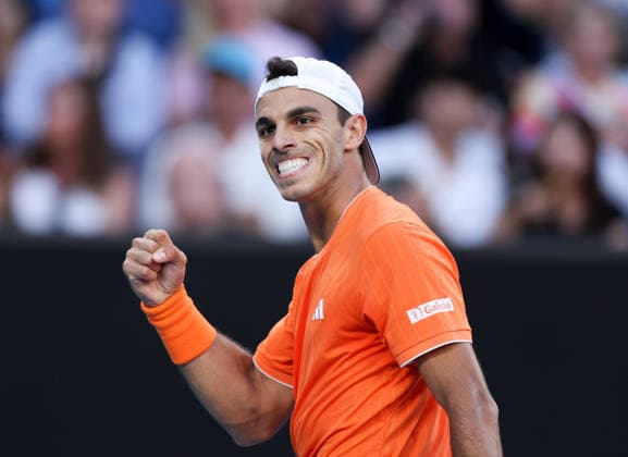 (260123) -- MELBOURNE, Jan. 23, 2026 -- Francisco Cerundolo celebrates during the men s singles 3rd round match between Andrey Rublev of Russia and Francisco Cerundolo of Argentina at the Australian Open tennis tournament in Melbourne, Australia, Jan. 23, 2026. ) (SP)AUSTRALIA-MELBOURNE-TENNIS-AUSTRALIAN OPEN-MEN S SINGLES MaxPing 
