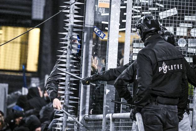 Picture shows an altercation between Dutch police and KRC Genk supporters ahead of a soccer game between Dutch soccer club FC Utrecht and Belgian KRC Genk, on Thursday 22 January 2026 in Utrecht, Netherlands, the seventh game (out of 8) in the league phase of the UEFA Europa League competition. TOM GOYVAERTS TomxGoyvaerts  x157953733x