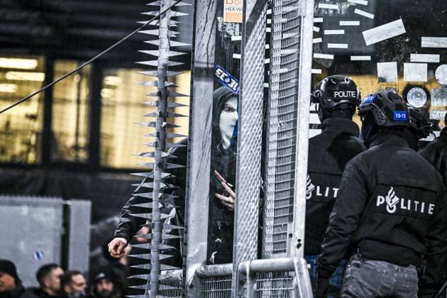 Picture shows an altercation between Dutch police and KRC Genk supporters ahead of a soccer game between Dutch soccer club FC Utrecht and Belgian KRC Genk, on Thursday 22 January 2026 in Utrecht, Netherlands, the seventh game (out of 8) in the league phase of the UEFA Europa League competition. TOM GOYVAERTS TomxGoyvaerts  x157954077x