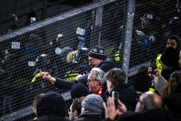 a FC Utrecht supporter provokes at a soccer game between Dutch soccer club FC Utrecht and Belgian KRC Genk, on Thursday 22 January 2026 in Utrecht, Netherlands, the seventh game (out of 8) in the league phase of the UEFA Europa League competition. TOM GOYVAERTS TomxGoyvaerts  x157954190x