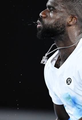 (260123) -- MELBOURNE, Jan. 23, 2026 -- Frances Tiafoe reacts during the men s singles 3rd round match between Alex de Minaur of Australia and Frances Tiafoe of the United States at the Australian Open tennis tournament in Melbourne, Australia, Jan. 23, 2026. (Photo by Xinhua) (SP)AUSTRALIA-MELBOURNE-TENNIS-AUSTRALIAN OPEN-MEN S SINGLES WangxShen 