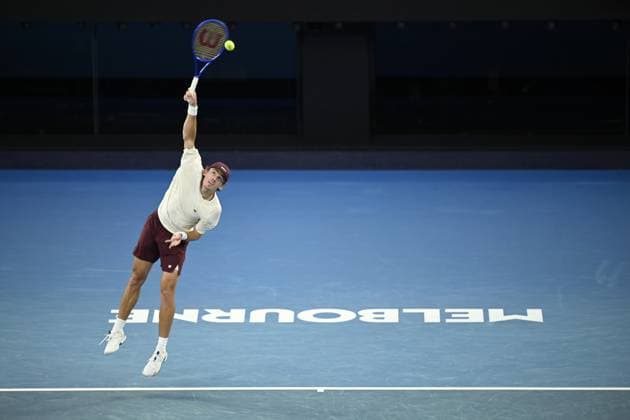 (260123) -- MELBOURNE, Jan. 23, 2026 -- Alex de Minaur serves during the men s singles 3rd round match between Alex de Minaur of Australia and Frances Tiafoe of the United States at the Australian Open tennis tournament in Melbourne, Australia, Jan. 23, 2026. (Photo by Xinhua) (SP)AUSTRALIA-MELBOURNE-TENNIS-AUSTRALIAN OPEN-MEN S SINGLES WangxShen 