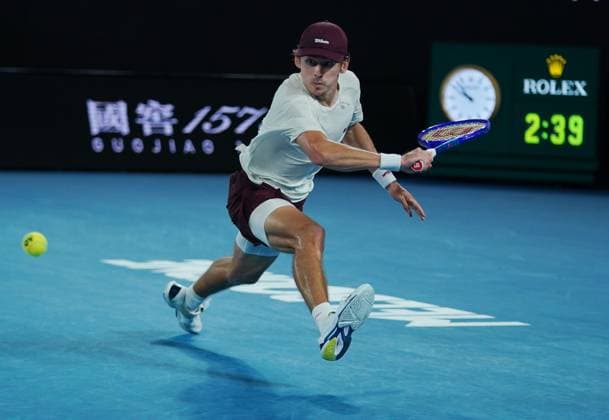 (260123) -- MELBOURNE, Jan. 23, 2026 -- Alex de Minaur hits a return during the men s singles 3rd round match between Alex de Minaur of Australia and Frances Tiafoe of the United States at the Australian Open tennis tournament in Melbourne, Australia, Jan. 23, 2026. (Photo by Xinhua) (SP)AUSTRALIA-MELBOURNE-TENNIS-AUSTRALIAN OPEN-MEN S SINGLES WangxShen 