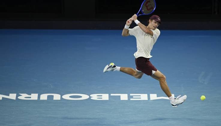 (260123) -- MELBOURNE, Jan. 23, 2026 -- Alex de Minaur hits a return during the men s singles 3rd round match between Alex de Minaur of Australia and Frances Tiafoe of the United States at the Australian Open tennis tournament in Melbourne, Australia, Jan. 23, 2026. (Photo by Xinhua) (SP)AUSTRALIA-MELBOURNE-TENNIS-AUSTRALIAN OPEN-MEN S SINGLES WangxShen 