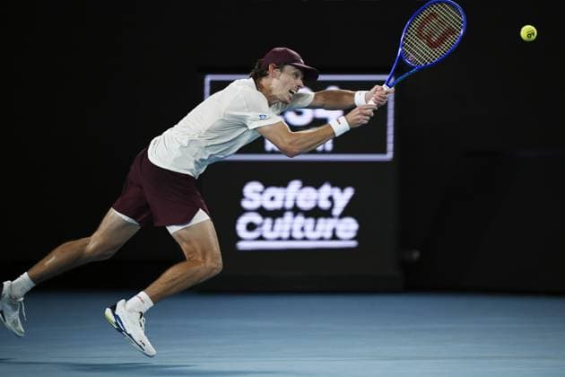 (260123) -- MELBOURNE, Jan. 23, 2026 -- Alex de Minaur hits a return during the men s singles 3rd round match between Alex de Minaur of Australia and Frances Tiafoe of the United States at the Australian Open tennis tournament in Melbourne, Australia, Jan. 23, 2026. (Photo by Xinhua) (SP)AUSTRALIA-MELBOURNE-TENNIS-AUSTRALIAN OPEN-MEN S SINGLES WangxShen 