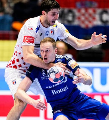 260123 Marko Mamic of Croatia and Omar Ingi Magnusson of Iceland during the EHF European Handball Championship main round match between Iceland and Croatia on January 23, 2026 in Malmö. Photo: Petter Arvidson BILDBYRAN kod PA PA1134 handball handboll handball handbolls-em 2026 croatia kroatien island iceland ehf european handball championship bbeng grappa33 Copyright: PETTERxARVIDSON BB260123PA057