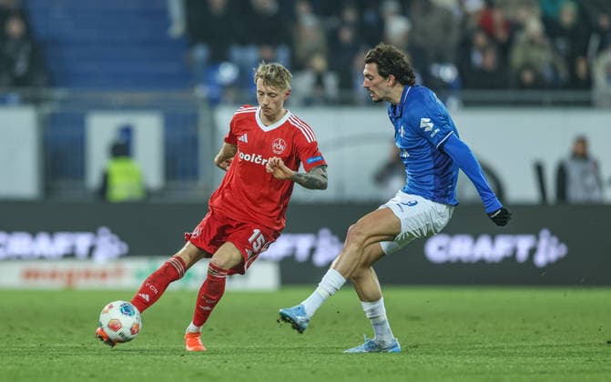 GER, Darmstadt, SV Darmstadt 98 vs 1. FC Nürnberg, 2. Bundesliga, Fussball, DFB, Spielzeit 2025 2026, Merck-Stadion am Böllenfalltor, 19. Spieltag im Bild v.l.: Tim Drexler (1. FC Nürnberg 15), Fraser Hornby (SV Darmstadt 98 9) DFB DFL REGULATIONS PROHIBIT ANY USE OF PHOTOGRAPHS AS IMAGE SEQUENCES AND OR QUASI-VIDEO, 23.01.2026