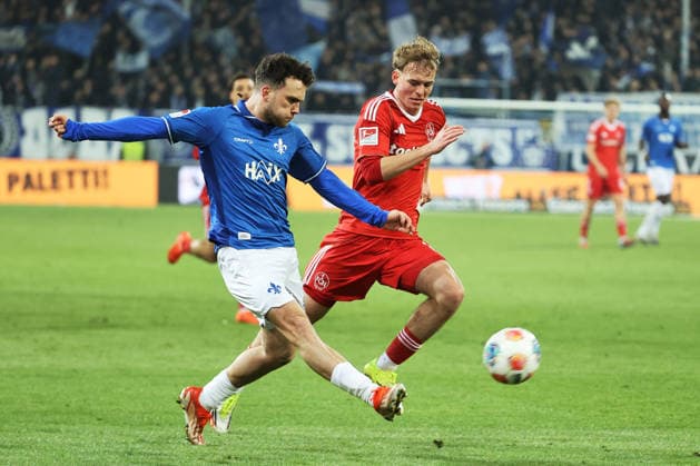 23.01.2026, xtvx, Fussball 2.Bundesliga, SV Darmstadt 98 - 1.FC Nürnberg v.l. Zweikampf, Duell, duel, tackle, compete Sergio Lopez (SV Darmstadt 98) Fabio Gruber (1. FC Nuernberg) (DFL DFB REGULATIONS PROHIBIT ANY USE OF PHOTOGRAPHS as IMAGE SEQUENCES and or QUASI-VIDEO) Darmstadt