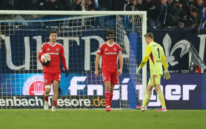 23.01.2026, Fussball 2. Bundesliga, SV Darmstadt 98 - 1. FC Nürnberg, emonline, emspor, despor, v.l., Adam Markhiev (1. FC Nürnberg), Fabio Gruber (1. FC Nürnberg), Torwart Jan Reichert (1. FC Nürnberg) enttaeuscht, enttaeuscht schauend, dissapointed, traurig, frustiert, frust, gefrustet, frustrated DFL DFB REGULATIONS PROHIBIT ANY USE OF PHOTOGRAPHS AS IMAGE SEQUENCES AND OR QUASI-VIDEO. xdcx