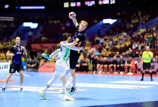Slovenia s Domen Makuc tries to stop Sweden s Eric Johansson during the European Handball Championship s intermediate round match between Slovenia and Sweden at Malmö Arena, Malmö, Sweden, January 26, 2026. MALMÖ SWEDEN x10600x