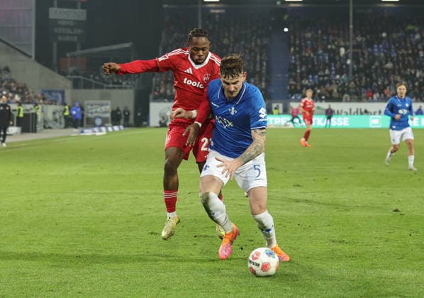 23.01.2026 - Fussball - Saison 2025 2026 - 2. Fussball - Bundesliga - 19. Spieltag: SV Darmstadt 98 SVD D98 ( Lilien ) - 1. FC Nürnberg FCN ( Club ) - Sportfoto Zink DaMa - xdaxmax - DFL regulations prohibit any use of photographs as image sequences and or quasi-video - only for editorial use - Mohamed Ali Zoma (23, 1. FC Nürnberg FCN ) Matej Maglica (5, SV Darmstadt 98 D98 SV98 )