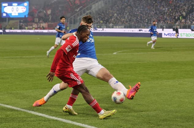 23.01.2026 - Fussball - Saison 2025 2026 - 2. Fussball - Bundesliga - 19. Spieltag: SV Darmstadt 98 SVD D98 ( Lilien ) - 1. FC Nürnberg FCN ( Club ) - Sportfoto Zink DaMa - xdaxmax - DFL regulations prohibit any use of photographs as image sequences and or quasi-video - only for editorial use - Mohamed Ali Zoma (23, 1. FC Nürnberg FCN ) Matej Maglica (5, SV Darmstadt 98 D98 SV98 )