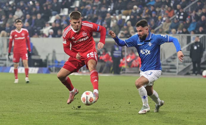 23.01.2026 - Fussball - Saison 2025 2026 - 2. Fussball - Bundesliga - 19. Spieltag: SV Darmstadt 98 SVD D98 ( Lilien ) - 1. FC Nürnberg FCN ( Club ) - Sportfoto Zink DaMa - xdaxmax - DFL regulations prohibit any use of photographs as image sequences and or quasi-video - only for editorial use - Finn Ole Becker (25, 1. FC Nürnberg FCN ) Marco Richter (23, SV Darmstadt 98 D98 SV98 )