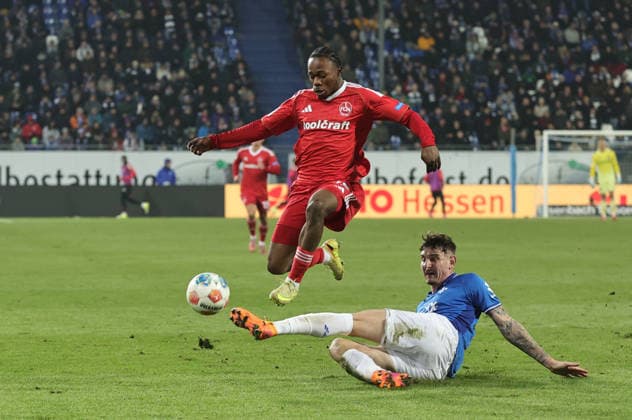 23.01.2026 - Fussball - Saison 2025 2026 - 2. Fussball - Bundesliga - 19. Spieltag: SV Darmstadt 98 SVD D98 ( Lilien ) - 1. FC Nürnberg FCN ( Club ) - Sportfoto Zink DaMa - xdaxmax - DFL regulations prohibit any use of photographs as image sequences and or quasi-video - only for editorial use - Mohamed Ali Zoma (23, 1. FC Nürnberg FCN ) Matej Maglica (5, SV Darmstadt 98 D98 SV98 )