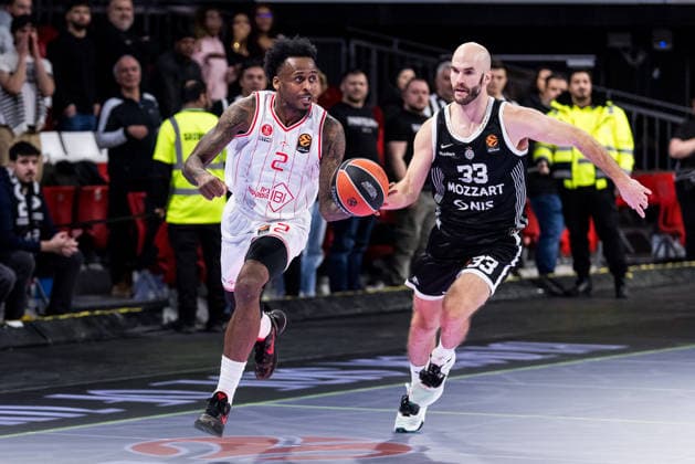 MUNICH, GERMANY - JANUARY 23: Antonio Blakeney (Hapoel IBI Tel Aviv, 2) controls the ball against Nick Calathes (Partizan Mozzart Bet Belgrade, 33) during the Turkish Airlines EuroLeague match between Partizan Mozzart Bet Belgrade vs. Hapoel IBI Tel Aviv at BMW Park on round 24 of Turkish Airlines EuroLeague on January 23, 2026 in Munich, Germany. Bavaria Germany Copyright: xSteffiexWunderlx