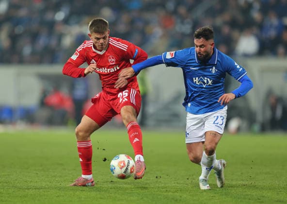 23.01.2026, Fussball 2. Bundesliga, SV Darmstadt 98 - 1. FC Nürnberg, emonline, emspor, despor, v.l., Finn Becker (1. FC Nürnberg), Marco Richter (SV Darmstadt 98) DFL DFB REGULATIONS PROHIBIT ANY USE OF PHOTOGRAPHS AS IMAGE SEQUENCES AND OR QUASI-VIDEO. xdcx