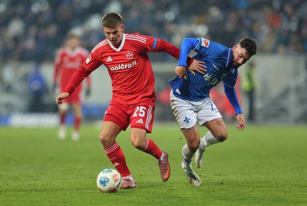 23.01.2026, Fussball 2. Bundesliga, SV Darmstadt 98 - 1. FC Nürnberg, emonline, emspor, despor, v.l., Finn Becker (1. FC Nürnberg), Marco Richter (SV Darmstadt 98) DFL DFB REGULATIONS PROHIBIT ANY USE OF PHOTOGRAPHS AS IMAGE SEQUENCES AND OR QUASI-VIDEO. xdcx