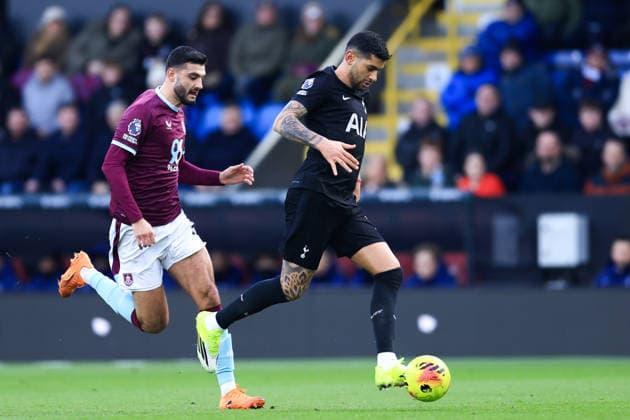 Burnley, England, 24th January 2026. Cristian Romero of Tottenham Hotspur runs with the ball whilst under pressure from Armando Broja of Burnley during the Burnley vs Tottenham Hotspur Premier League match at Turf Moor, Burnley. Picture credit should read: Jessica Hornby Sportimage EDITORIAL USE ONLY. No use with unauthorised audio, video, data, fixture lists, club league logos or live services. Online in-match use limited to 120 images, no video emulation. No use in betting, games or single club league player publications. SPI_031_JH_BURNLEY_TOTTENHAM SPI-4474-0030