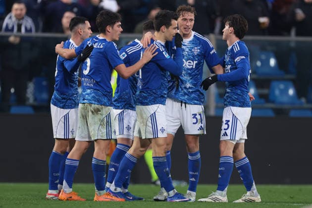 Como, Italy, 24th January 2026. Anastasios Douvikas of Como 1907 celebrates with team mates after scoring to give the hosts a 4-0 lead during the Como 1907 vs Torino Serie A match at Stadio Giuseppe Sinigaglia, Como. Picture credit should read: Jonathan Moscrop Sportimage EDITORIAL USE ONLY. No use with unauthorised audio, video, data, fixture lists, club league logos or live services. Online in-match use limited to 120 images, no video emulation. No use in betting, games or single club league player publications. SPI_045_JM_COMO_TORO_ SPI-4418-0045