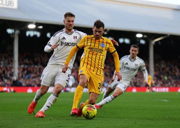 24th January 2026; Craven Cottage, Fulham, London, England; Premier League Football, Fulham versus Brighton and Hove Albion; Pascal Gross of Brighton &amp; Hove Albion under pressure from Joachim Andersen of Fulham  JohnxPatrickxFletcher Content restricted for UK based newspaper