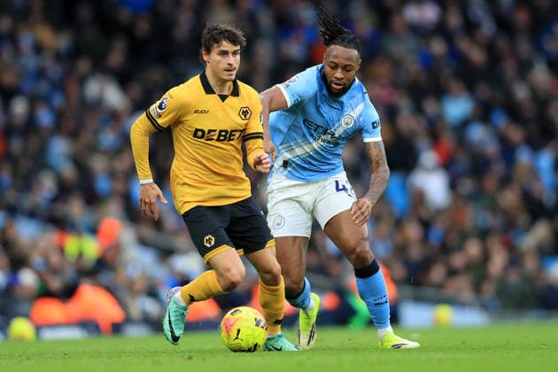 24th January 2026; Etihad Stadium, Manchester, Lancashire, England; Premier League Football, Manchester City versus Wolverhampton Wanderers; Hugo Bueno of Wolverhampton Wanderers competes for the ball with Antoine Semenyo of Manchester City  DavidxBlunsden Content restricted for UK based newspaper
