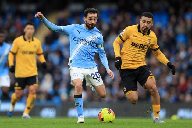 24th January 2026; Etihad Stadium, Manchester, Lancashire, England; Premier League Football, Manchester City versus Wolverhampton Wanderers; Bernardo Silva of Manchester City takes on Andre of Wolverhampton Wanderers  DavidxBlunsden Content restricted for UK based newspaper
