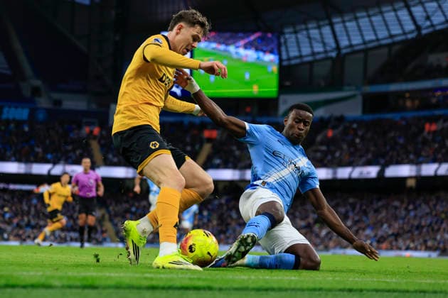 Manchester City v Wolverhampton Wanderers, Premier League Jorgen Strand Larsen (9) of Wolverhampton Wanderers and Marc Guehi (15) of Manchester City challenge for the ball during the Premier League match between Manchester City and Wolverhampton Wanderers at the Etihad Stadium, Manchester, UK on 24 January 2026. Manchester Etihad Stadium Manchester UK Editorial use only DataCo restrictions apply See www.football-dataco.com , Copyright: xConorxMolloyx PSI-23610-0040