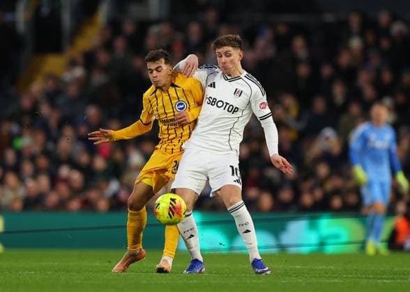 24th January 2026; Craven Cottage, Fulham, London, England; Premier League Football, Fulham versus Brighton and Hove Albion; Tom Cairney of Fulham under pressure from Yasin Ayari of Brighton &amp; Hove Albion  JohnxPatrickxFletcher Content restricted for UK based newspaper
