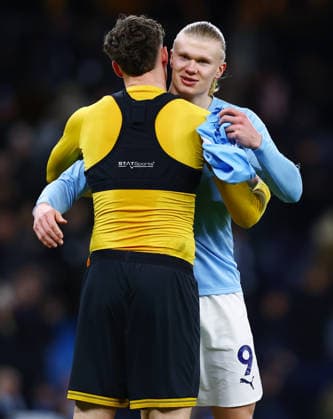 Erling Haaland of Manchester City swaps shirts with Jorgen Strand Larsen of Wolverhampton Wanderers at the end of the match Manchester City v Wolverhampton Wanderers, Premier League, Football, Etihad Stadium, Manchester, UK - 24 Jan 2026Manchester Etihad Stadium United Kingdom EDITORIAL USE ONLY No use with unauthorised audio, video, data, fixture lists, club league logos or live services. Online in-match use limited to 120 images, no video emulation. No use in betting, games or single club league player publications.  Copyright: xMattxWest Shutterstockx 16425986an