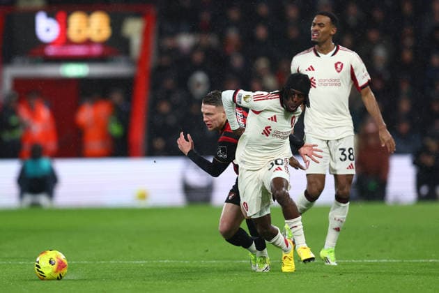 Bournemouth, England, 24th January 2026. Adrien Truffert of Bournemouth and Jeremie Frimpong of Liverpool challenge for the ball during the AFC Bournemouth vs Liverpool Premier League match at the Vitality Stadium, Bournemouth. Picture credit should read: Paul Terry Sportimage EDITORIAL USE ONLY. No use with unauthorised audio, video, data, fixture lists, club league logos or live services. Online in-match use limited to 120 images, no video emulation. No use in betting, games or single club league player publications. SPI_011_PT_Bournemouth_Liverpool SPI-4475-0011
