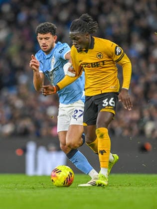 Manchester City v Wolverhampton Wanderers Premier League Mateus Mane of Wolverhampton Wanderers and Matheus Nunes of Manchester City during the Premier League match at the Etihad Stadium, Manchester 24 01 2026 UK Newspapers OUT Copyright: xKarlxVallantinex FIL-22858-0106